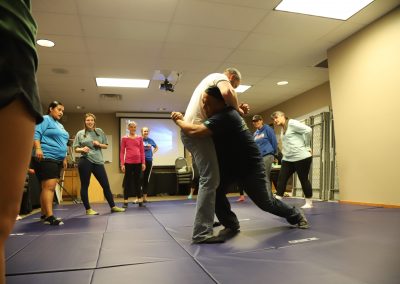 Instructions show students a self-defense tactic